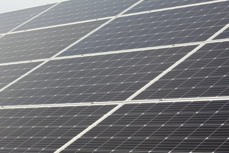 Detailed close-up of solar panels harnessing sunlight for sustainable energy generation.