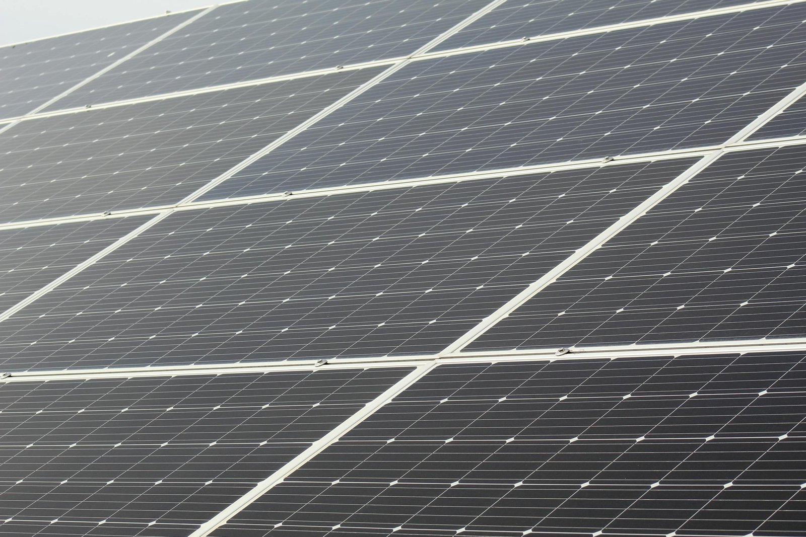 Detailed close-up of solar panels harnessing sunlight for sustainable energy generation.